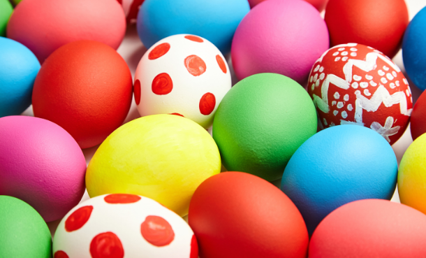 decorated eggs in many colors and polka dots