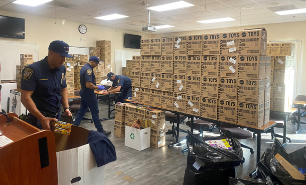 ES Firefighters sorting donated toys