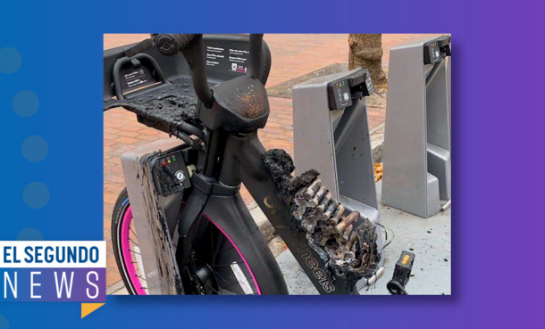 E-bike in a bike rack with charred battery