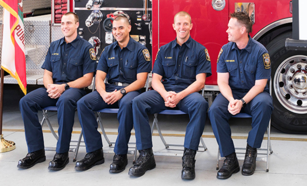 ESFD badge pinning four staff sitting in uniform