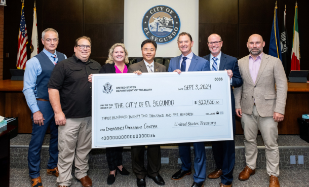 Rep. Ted Lieu presenting EOC grant funding to City Council