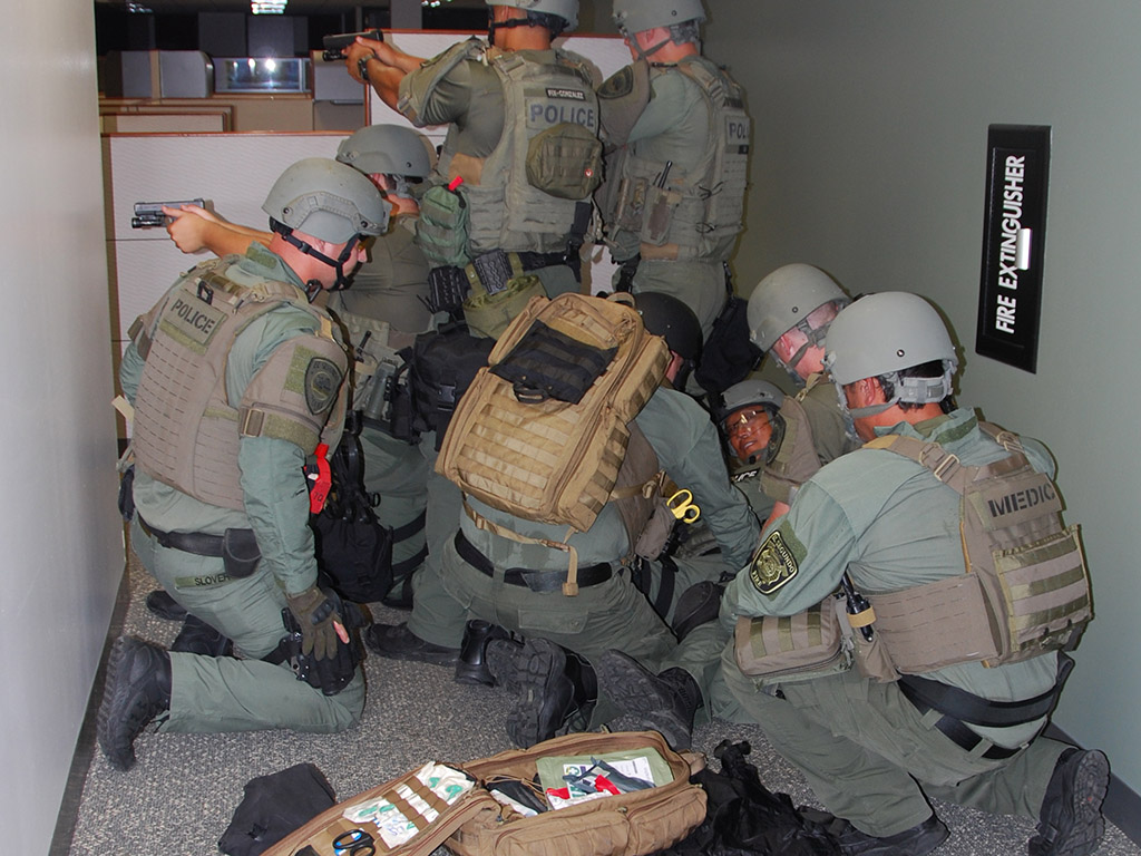 Tactical Paramedics training in patient packaging